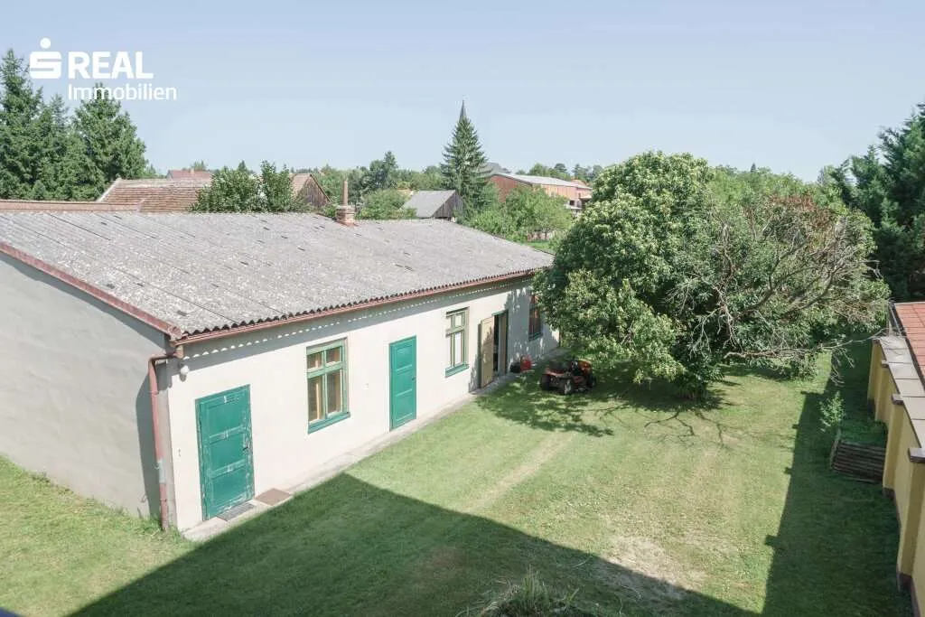 3 Wohneinheiten und ein Geschäftslokal mit vielen Lagerräumen auf 4.499m² Grund im Bauland Mischgebiet! - Ansicht 2