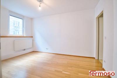 Moderne 2-Zimmer-Wohnung mit Tiefgarage und Einbauküche im 5. Bezirk Wien! – Bild 2