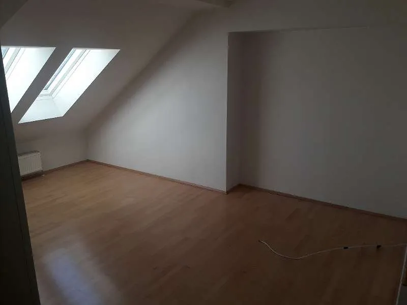 Dachgeschosswohnung mit Schlossbergblick - Ansicht 3