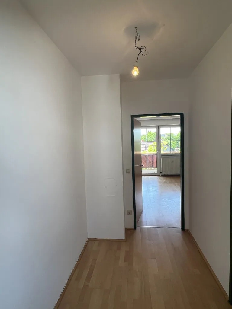 Sonnige Starterwohnung mit Carport und Grünblick in Leonding - ideal für Eigennutzer & Anleger - Ansicht 2