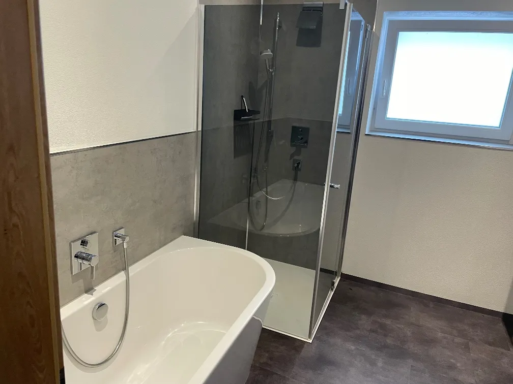 Attraktive 3-Zimmer Wohnung mit großer Dachterrasse in Niederndorf - Ansicht 2