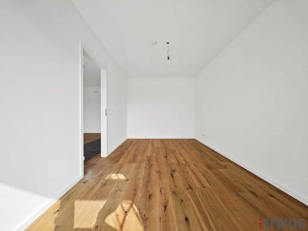 Ruhiger Innenhof | Erstbezug 2-Zimmerwohnung mit südseitigem Balkon | Luftwärmepumpe - Ansicht 3