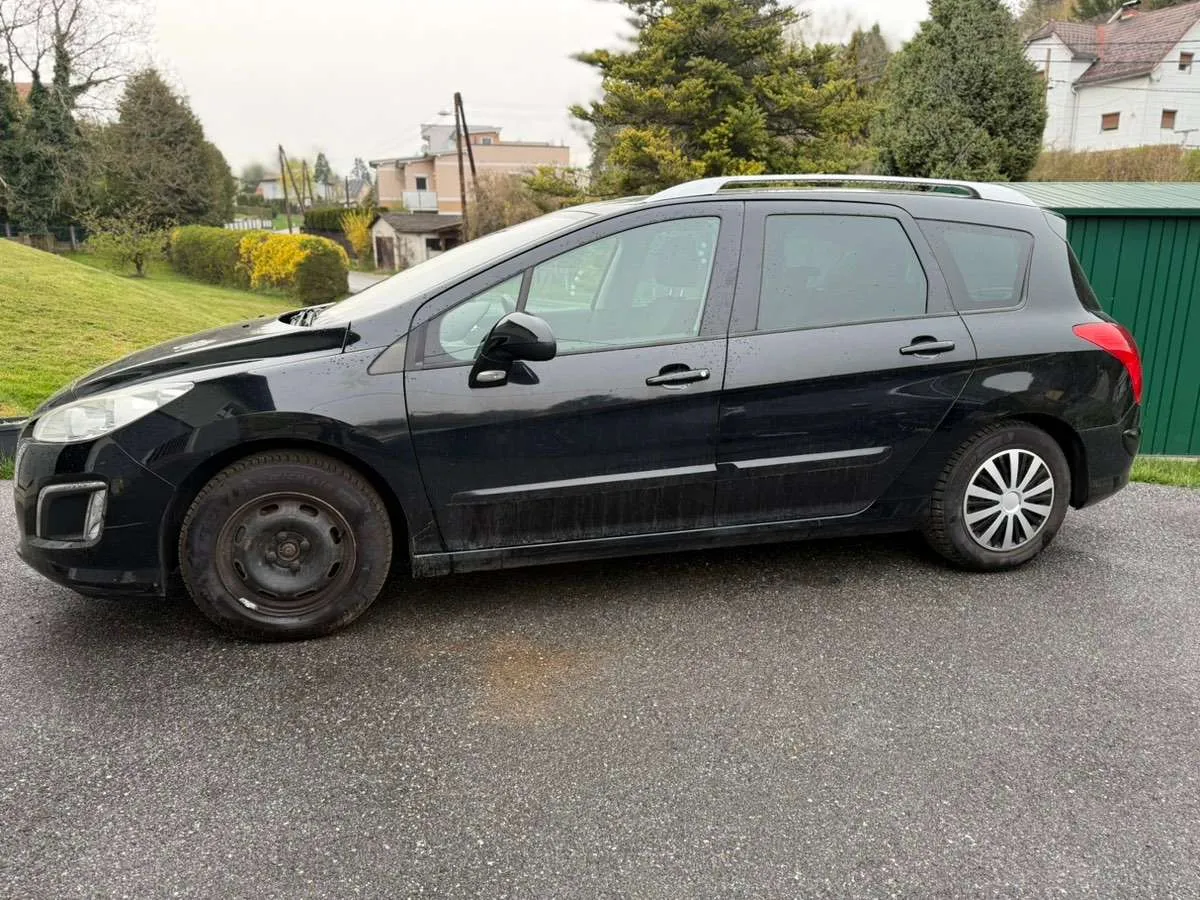 Peugeot 308 2012 photo 2