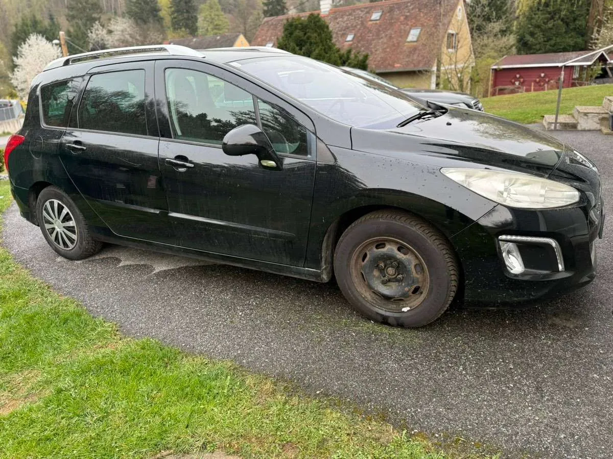 Peugeot 308 2012 photo 3