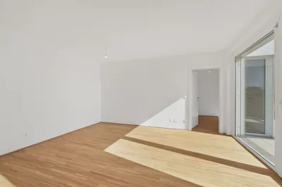 Moderne Erstbezug-Mietwohnungen mit privaten Freiflächen und Garage im 21. Bezirk – Bild 2