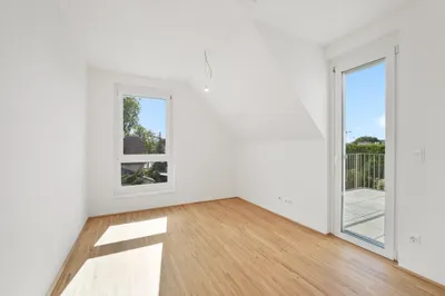 Moderne Erstbezug-Mietwohnungen mit privaten Freiflächen und Garage im 21. Bezirk – Bild 3
