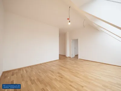 Dachgeschosswohnung mit großem Balkon Top-Erstbezug – Bild 2