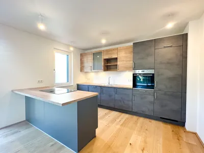 Nur 130 Meter zur U1! Charmante 2-Zimmer-Wohnung mit Balkon und Grünblick – Bild 3