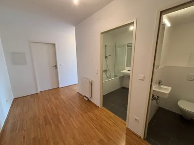 Helle Neubauwohnung 1020 + Stellplatz – Bild 3