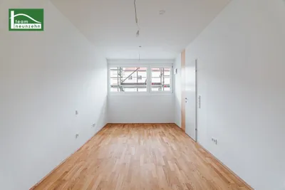 Moderne Neubauwohnung mit hochwertiger Ausstattung und Freifläche! – Bild 3