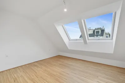 Moderne Erstbezug-Mietwohnungen mit privaten Freiflächen und Garage im 21. Bezirk – Bild 2