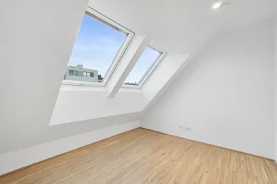 Moderne Erstbezug-Mietwohnungen mit privaten Freiflächen und Garage im 21. Bezirk – Bild 3