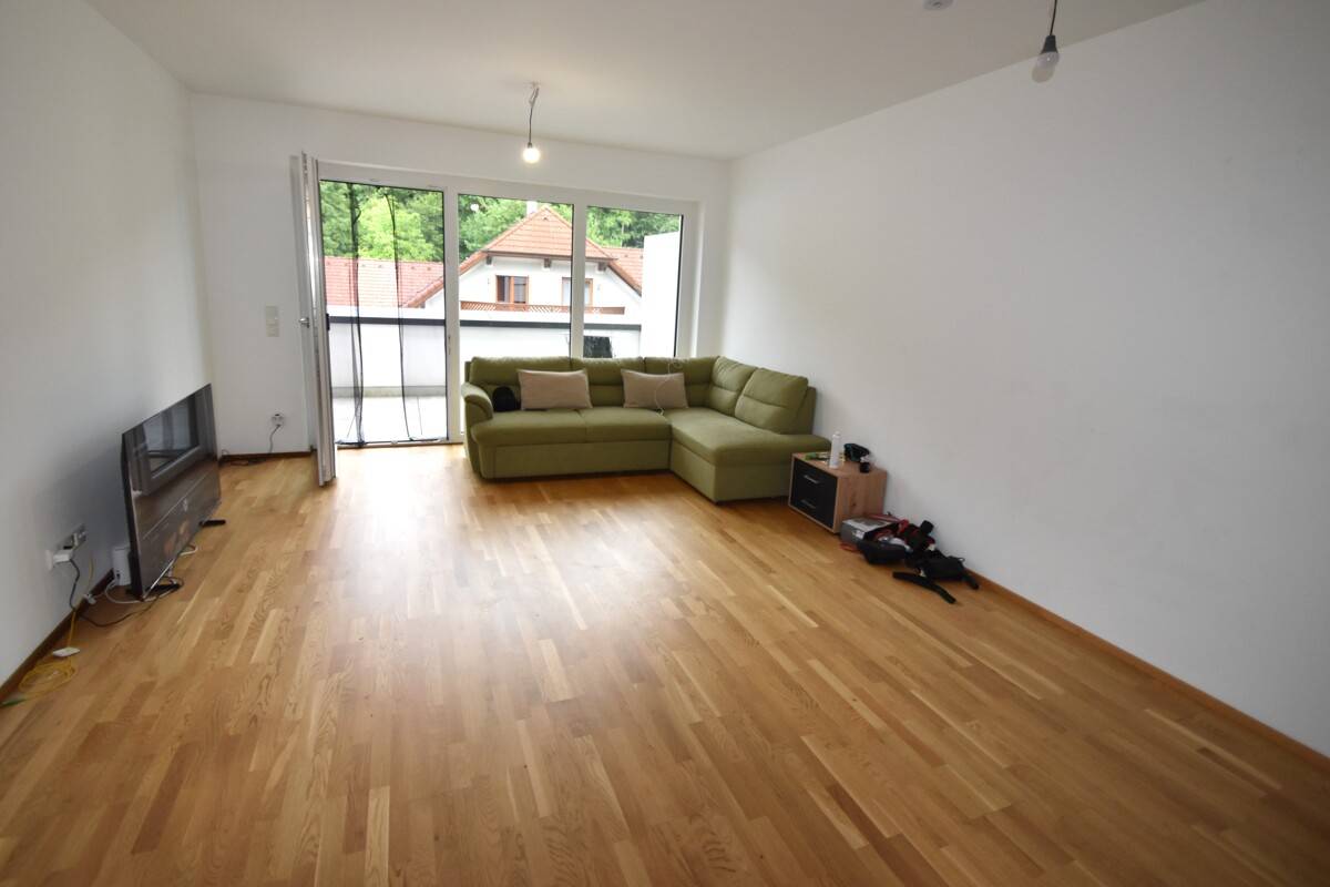 Vermietete Anlegerwohnung mit Tiefgaragenstellplatz in zentraler Grünruhelage - Ansicht 2