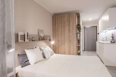 Pauschalmiete I JONN-Y möbliertes Apartment mit Balkon, inkl. Gym, Sauna, Dachterrasse, Community Area, Internet etc.! 7 Min. zum Stephansplatz! – Bild 3