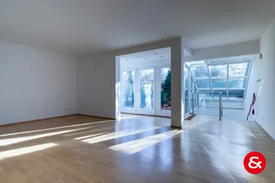 Gartenwohnung mit Büro- bzw. Hobbyebene und zwei Garagenplätzen! – Bild 2