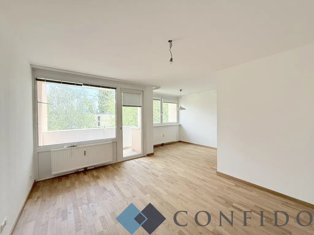 Großartig geschnittene 3 Zimmerwohnung mit Loggia und Grünblick - Ansicht 2