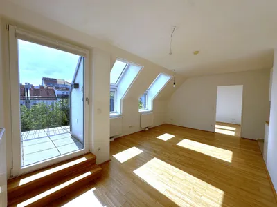 Moderne Dachgeschosswohnung mit Terrasse – Bild 3