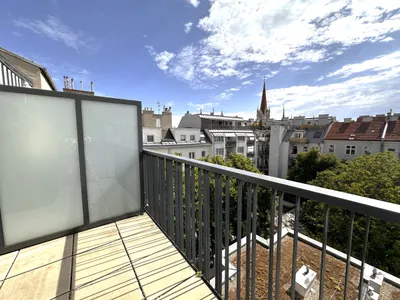 Moderne Dachgeschosswohnung mit Terrasse – Bild 2