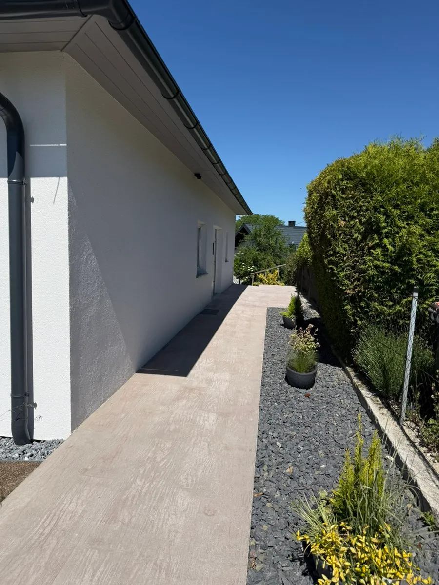 Charmantes Einfamilienhaus mit sonniger Grünlage und Atemberaubendem Panoramablick - Ansicht 3