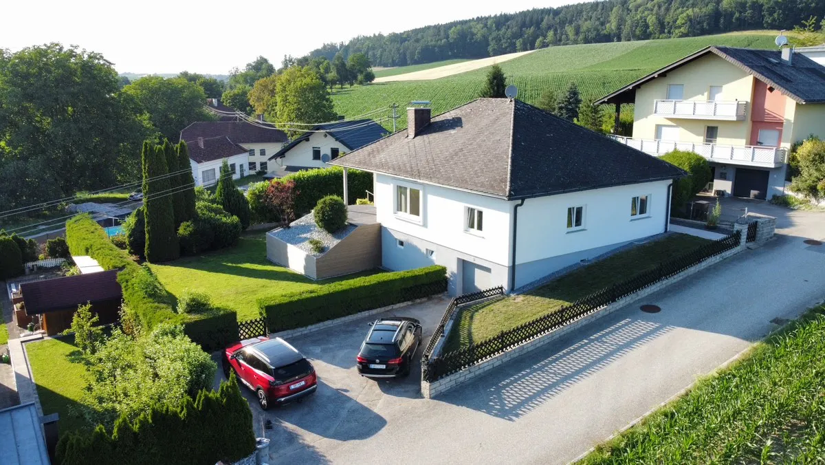 Charmantes Einfamilienhaus mit sonniger Grünlage und Atemberaubendem Panoramablick, Willing