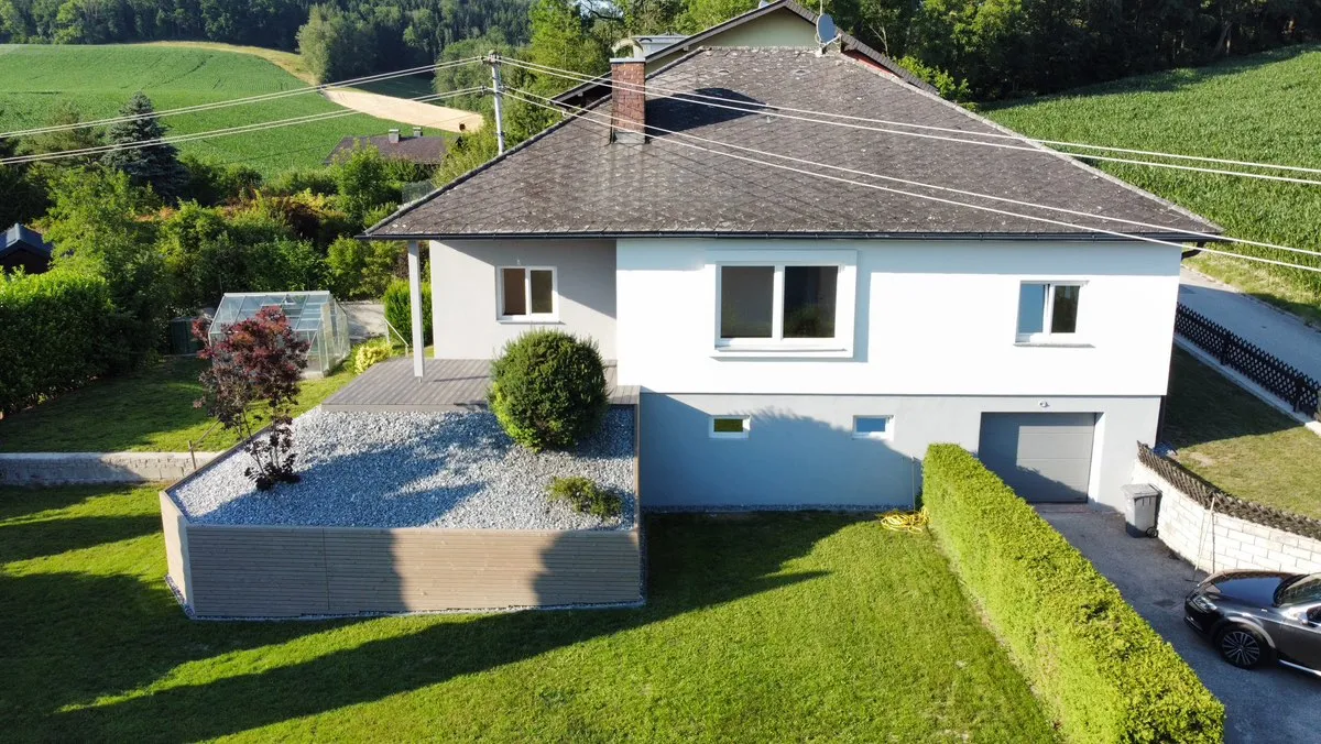 Charmantes Einfamilienhaus mit sonniger Grünlage und Atemberaubendem Panoramablick - Ansicht 2