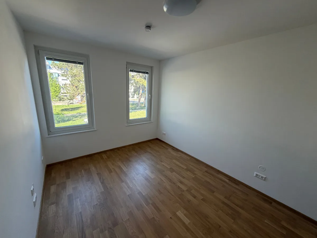 Modernes 1 1/2 Zimmer Büro mit Garten am Kagraner Platz - Erstbezug, Tiefgarage, U-Bahn-Nähe - Ansicht 3
