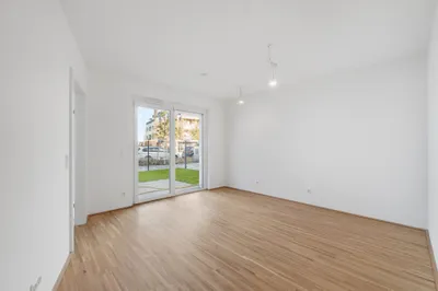 Moderne Erstbezug-Mietwohnungen mit privaten Freiflächen und Garage im 21. Bezirk – Bild 3
