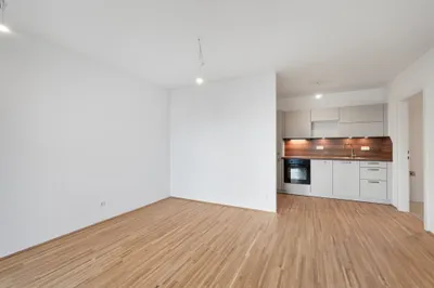 Moderne Erstbezug-Mietwohnungen mit privaten Freiflächen und Garage im 21. Bezirk