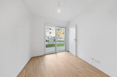 Moderne Erstbezug-Mietwohnungen mit privaten Freiflächen und Garage im 21. Bezirk – Bild 2