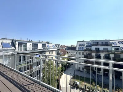 Großzügige Dachgeschosswohnung mit sonnigem Balkon - Klimaanlage - Erstbezug