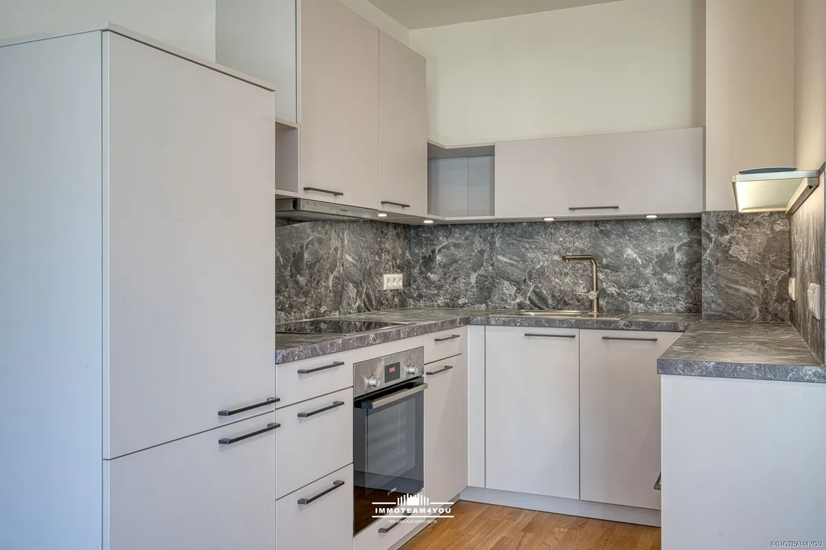 Moderner Komfort trifft auf unschlagbare Zentrumslage. XXL-Balkon und TG-Platz - Ansicht 3