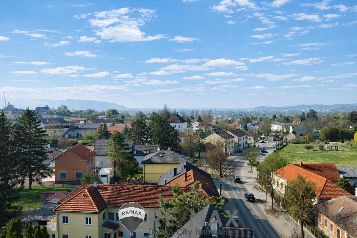 "Am Fuße des Bisambergs: großes Grundstück mit Bungalow und XXL-Garage" - Ansicht 2