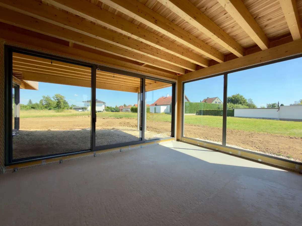 Moderner Design-Bungalow in nachhaltiger Massivholzbauweise - Exklusives Wohnen auf einer Ebene mit 203 m² Nutzfläche - Widok 3