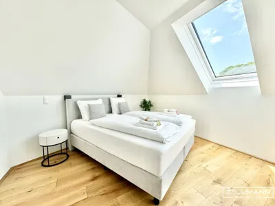 Stilvolle Dachgeschossresidenz mit hochwertiger Ausstattung und urbanem Wohnkomfort | ZELLMANN IMMOBILIEN – Bild 3