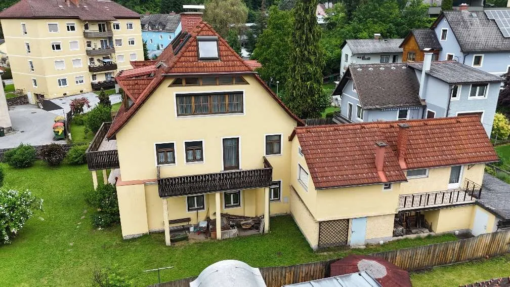 Attraktives Mehrfamilienwohnhaus mit Nebengebäude und 4 Garagen in ruhiger Lage am Rande des Stadtzentrums Voitsberg - Ansicht 2