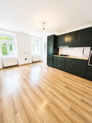Stilvolle Dachgeschosswohnung mit Gartenmitbenutzung – Bild 2