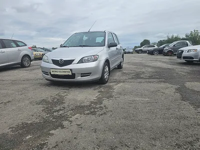 Mazda Mazda2 CD68 pickerl 10/27