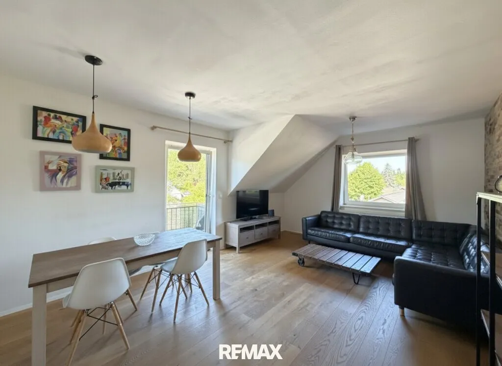 Attraktive 3-Zimmer-Wohnung im Dachgeschoss mit Carport - Ansicht 2