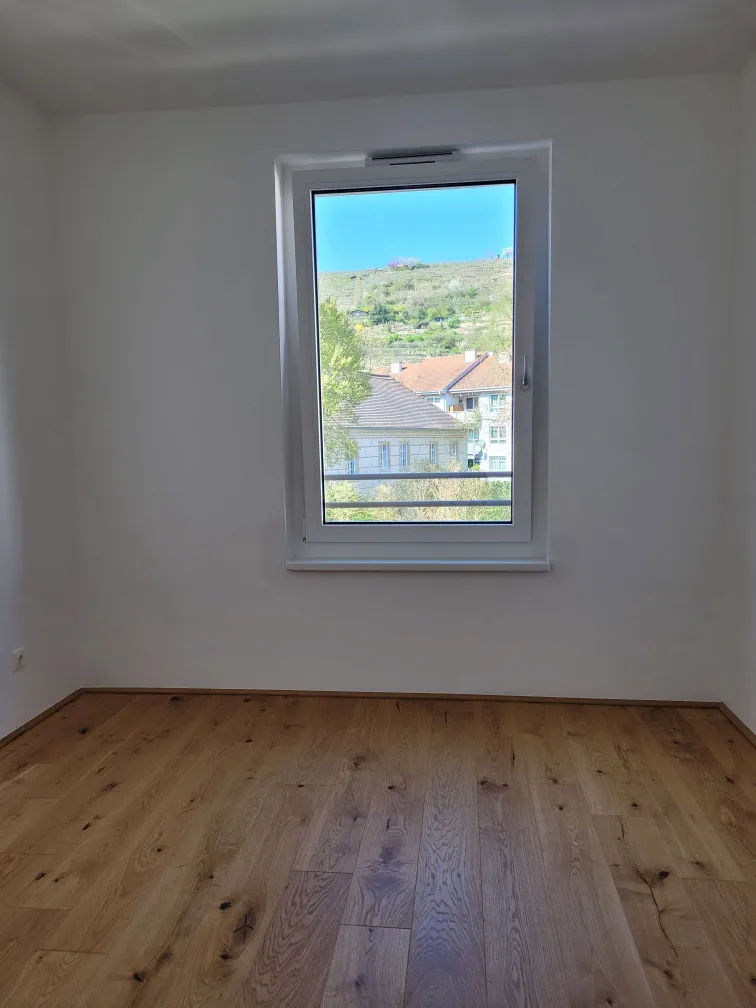 Erstbezug | Helle 2-Zimmer-Neubauwohnung mit Balkon & Weinbergblick - Ansicht 3