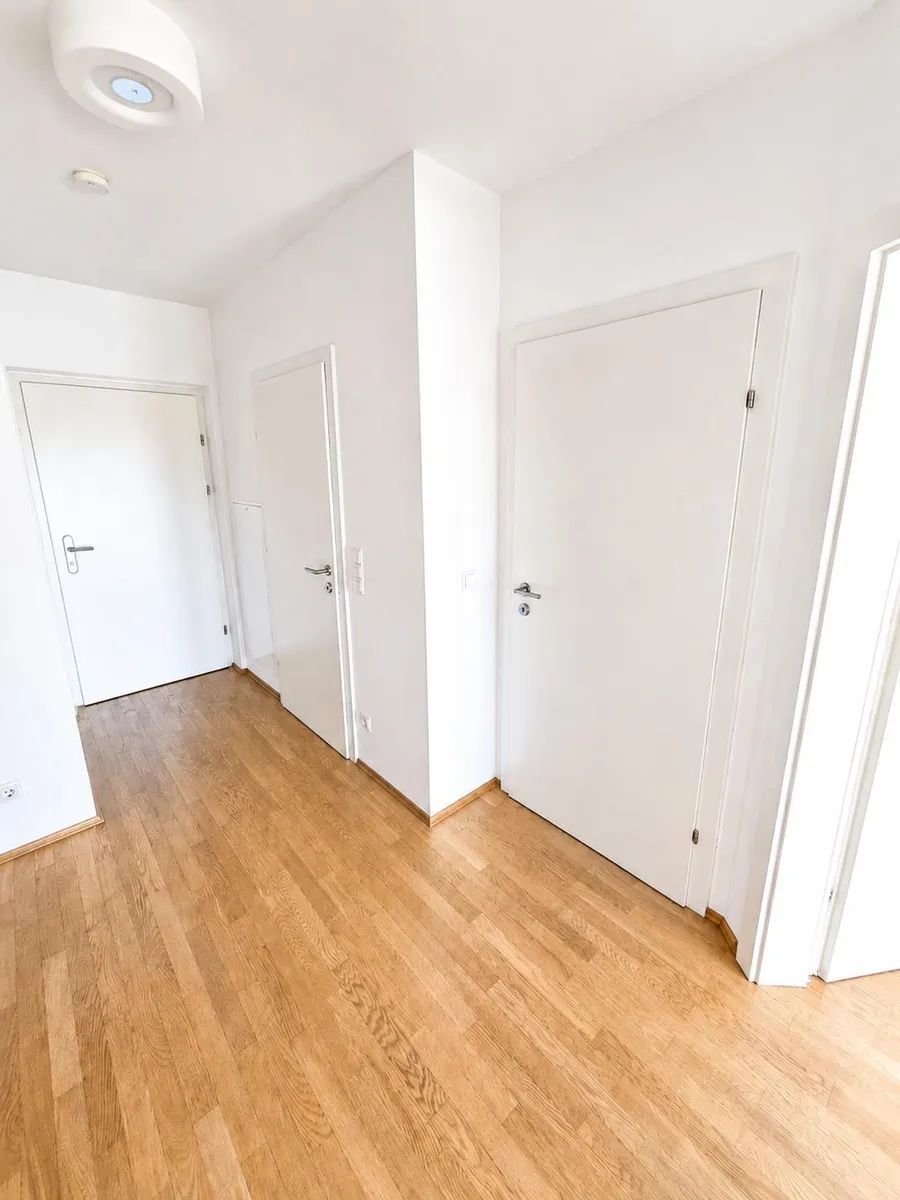 Moderne Neubauwohnung in mondäner Wohngegend mit Balkon - Ansicht 2