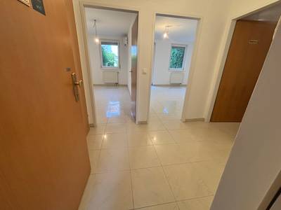 Provisionsfreie, sonnige, klimatisierte 2-Zimmer-Gartenwohnung am Liesingbach mit fast 70 m² Eigengarten in ruhiger Innenhoflage. – Bild 2