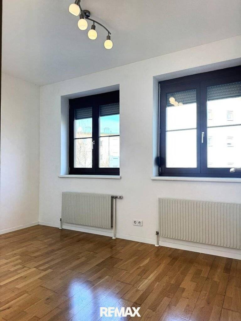 Eigentumswohnung mit Kamin und Garten - Ansicht 3