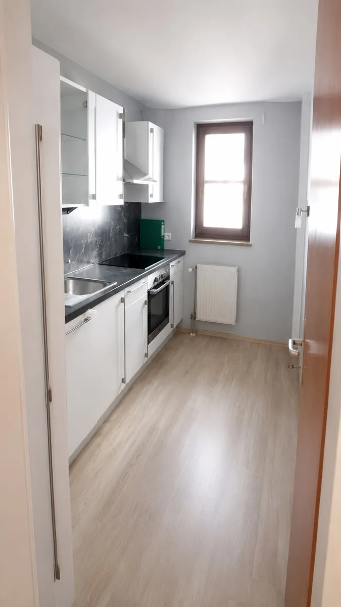 Helle 2-Zimmer-Wohnung mit Westbalkon und Tiefgaragenplatz im Zentrum von Henndorf am Wallersee - Ansicht 3