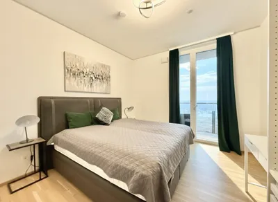 Exklusives Wohnen mit Panorama über Wien: Neuwertige 2-Zimmer-Wohnung mit Balkon in der 15. Etage – Bild 3