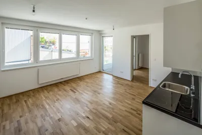 2-Zimmer-Neubauwohnung mit 6 m² Balkon - Hofruhelage