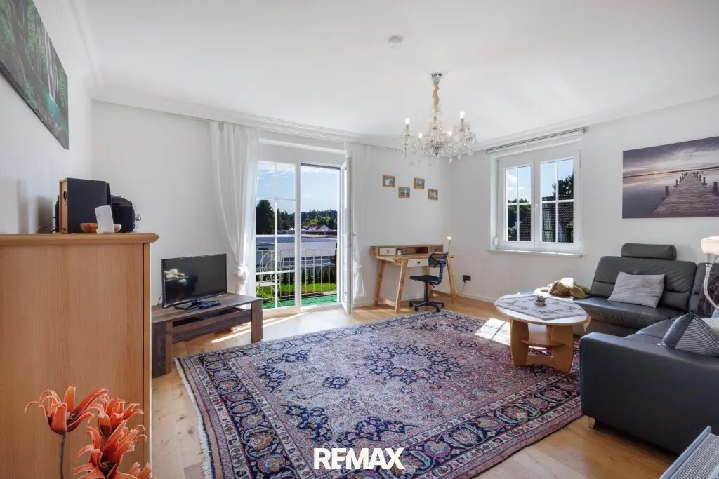 *Neuer Preis!* Charmante Eigentumswohnung mit Balkon & Kachelofen in Velden - Ansicht 2