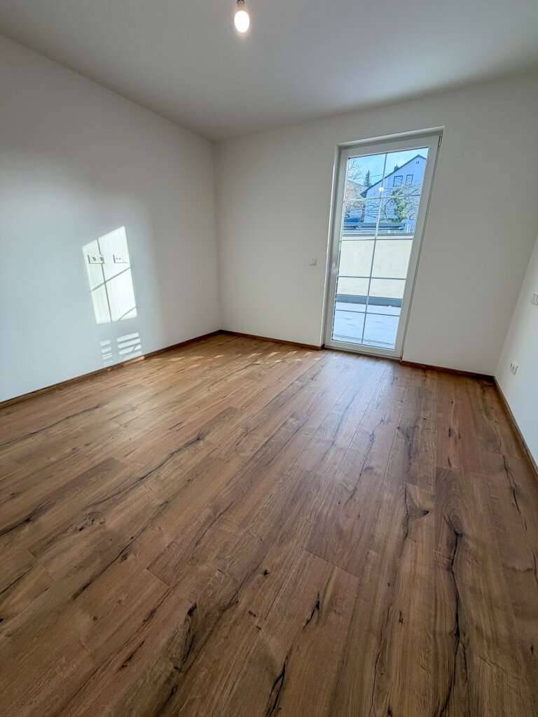 Moderne Erdgeschosswohnung mit Terrasse und Tiefgarage - Ansicht 3