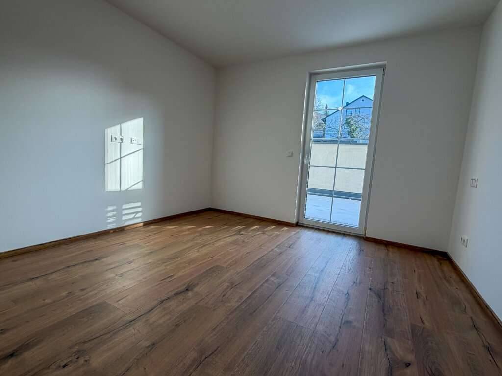 Moderne Erdgeschosswohnung mit Terrasse und Tiefgarage - Ansicht 2