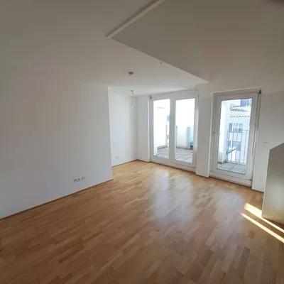 Stilvolle Dachgeschoss-Maisonettewohnung an der Alten Donau – Bild 2