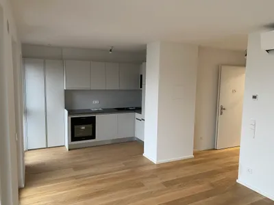 Helle und ruhige 2-Zimmer-Neubauwohnung mit Balkon & Klimaanlage in Meidling - optional mit Garagenstellplatz und 11-kW-E-Ladestation